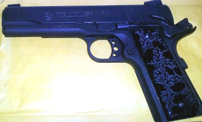 1911 Pistol with Engraved Skulls SPD Grips